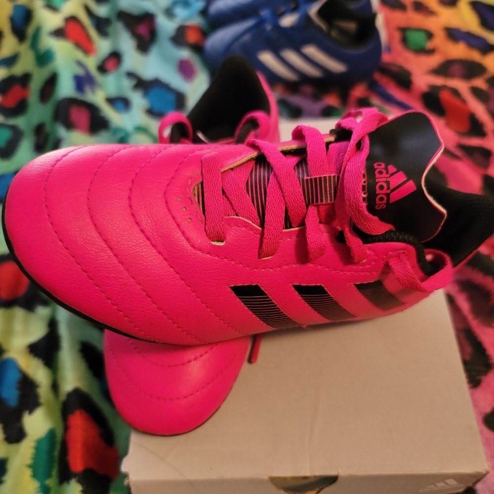 Girls Adidas Cleats barely worn.Like new condition.